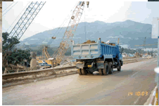 Vehicle was not washed to remove dusty materials before leaving the construction site