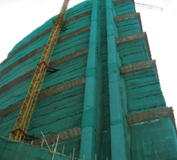 Dust screen for scaffolding and material hoist