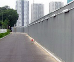 2.4m high hoarding with footing sealed by cement grout