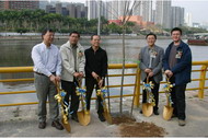 Participating in a tree planting ceremony with district councillors, LegCo member and local group