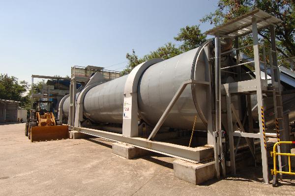 Photograph shows the rotary in-vessel composter where bio-degradation takes place.