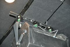 Overhung loudspeakers mounted to the ceiling by spring isolators to reduce structure-borne sound transmission