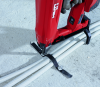The battery-driven fastening tool is capable of fastening conduits into concrete