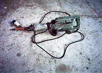 Breaker, hand-held, electric, with Noise Emission Label & Sound Power Level · (Sound Power Level specified in the label)