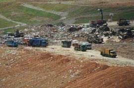 Image of Waste Truck Unloads at the Tipping Face