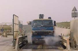 Image of The Vehicle Passes the Vehicle-Wash System after Unloading