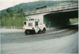 Image of Road sweeper cleans the access roads everyday to remove the spillage from the refuse collection vehicle.