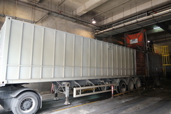 Image of Refuse is precompacted in the precompacted chamber. The precompacted refuse is reached the predefined weight, i.e., 24 tones, the compactor front gate will open. The ejection ram will push the precompacted refuse into the container.