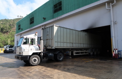 Image of The container is then transferred out and replaced by an empty one.