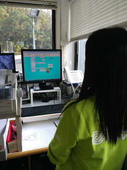 Image of The weighbridge operator will input the tractor number and the container number into the computer while the out time, gross weight of the container truck will also be recorded by the computer subsequently.