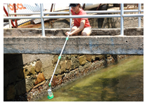 Sampling at a storm channel in Deep Water Bay Beach