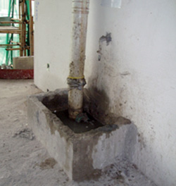 Wastewater collection basin at building floor