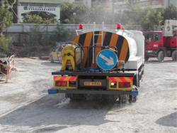 Water bowser for water spraying on haul road
