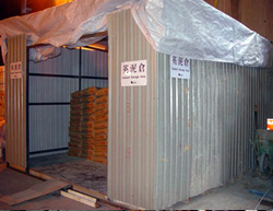 Storage housing for cement bags