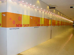 Enclose the work area with tight partition to avoid emission of fugitive dust and for aesthetic purpose.