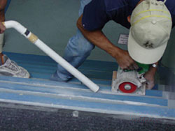 Use vacuum cleaner during grinding operations.